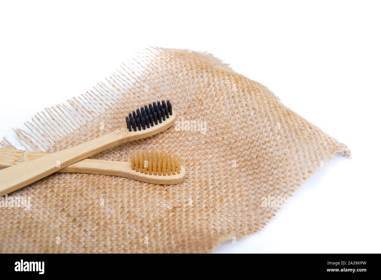 Bamboo tooth brush on white background Stock Photo