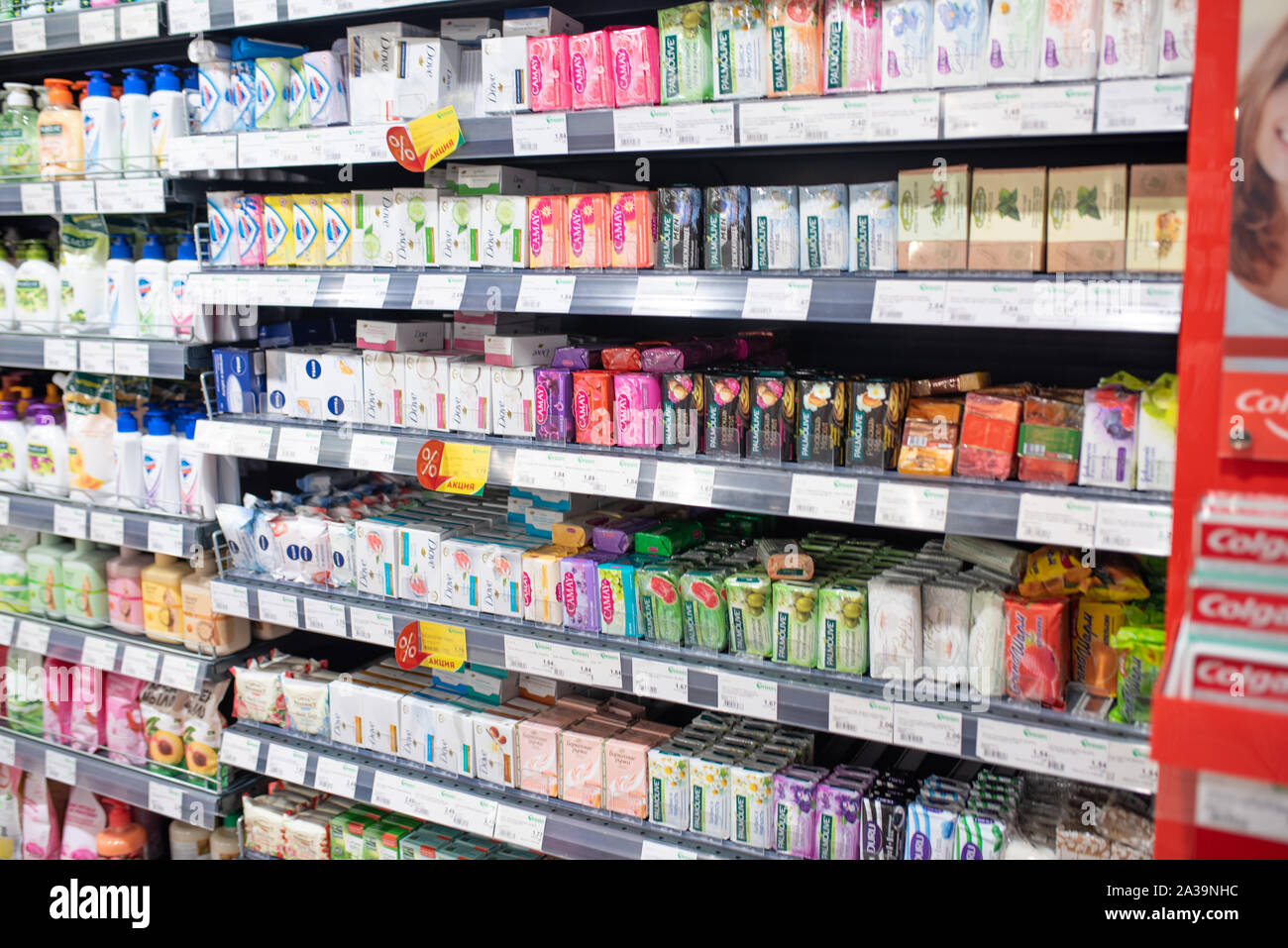 Minsk, Belarus - September 27, 2019: Counter with various soaps in a supermarket. Stock Photo