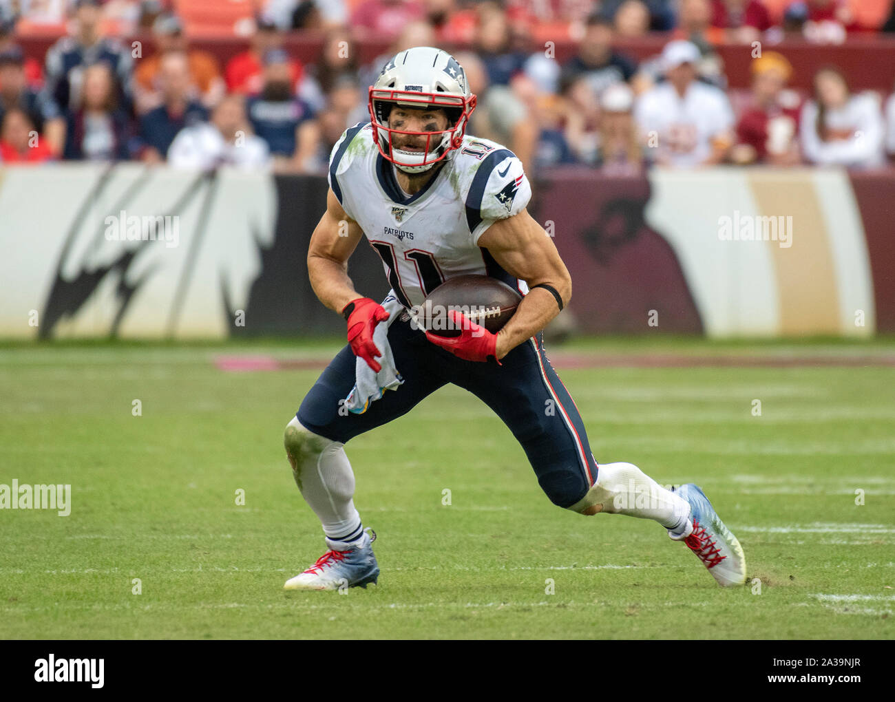 October 18, 2015: New England Patriots wide receiver Julian Edelman (11)  runs with the ball during NFL football game action between the New England  Patriots and the Indianapolis Colts at Lucas Oil