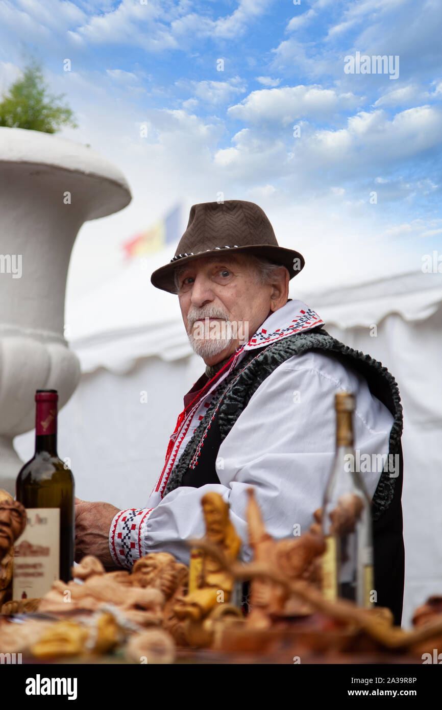 Chisinau, Moldova - October 5, 2019: Elderly man in a traditional Balkan costume. Stock Photo