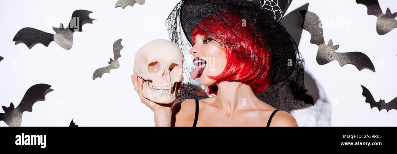 Panoramic Shot Of Girl In Black Witch Halloween Costume With Red