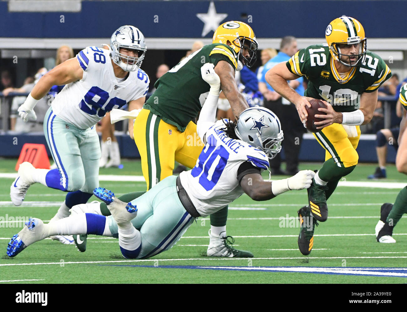 Dallas Cowboys defensive end DeMarcus Lawrence (90) runs a drill during  during NFL football practice in Frisco, Texas, Monday, Aug. 16, 2021. (AP  Photo/LM Otero Stock Photo - Alamy