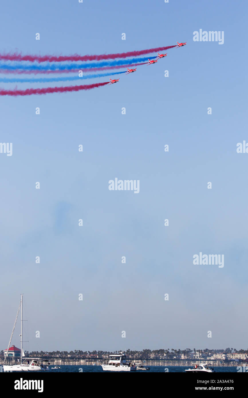 The British Royal Air Force Red Arrows Performing at The Great Pacific Airshow Huntington Beach California USA. the largest airshow in the USA Stock Photo