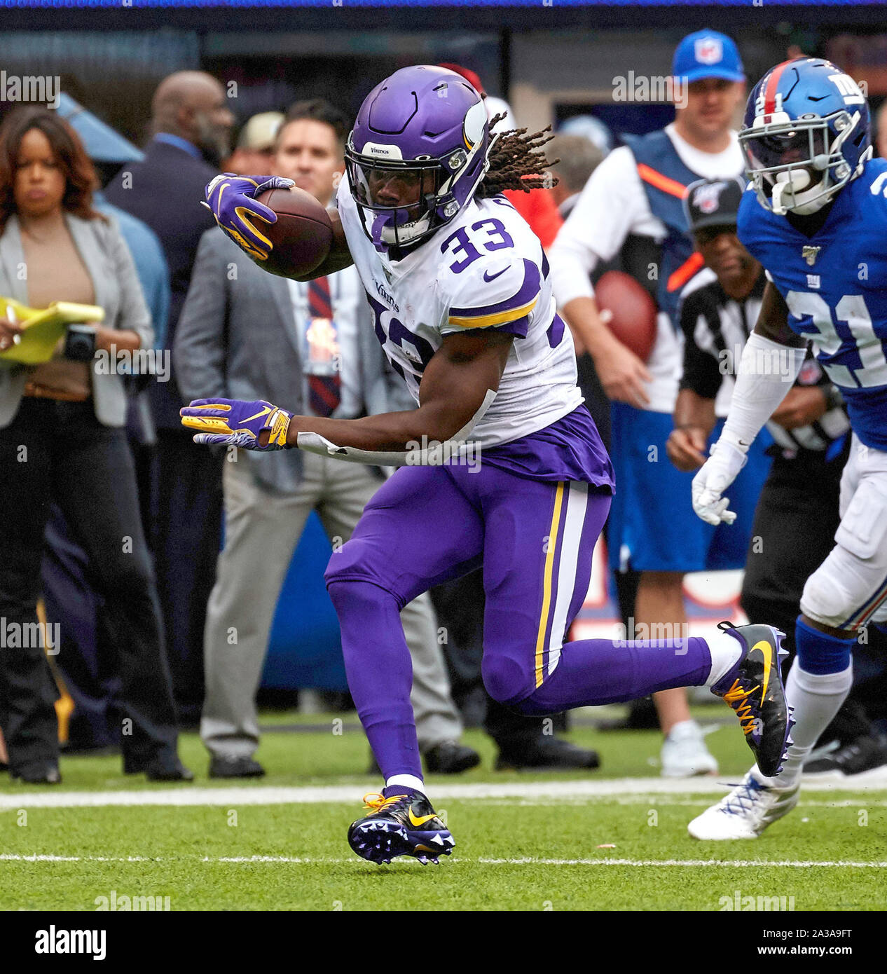 East Rutherford, New Jersey, USA. 6th Oct, 2019. Minnesota Vikings running  back Dalvin Cook (33) looks for running room during a NFL game between the  Minnesota Vikings and the New York Giants