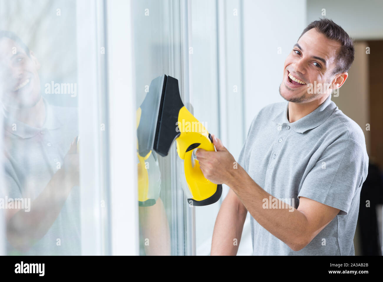 Steam Cleaning Windows with Pressure Editorial Photography - Image