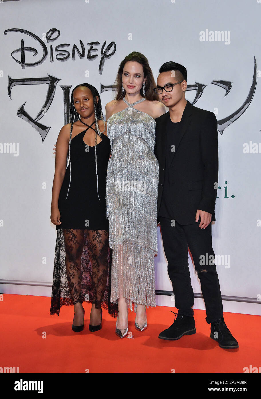 (L-R)Zahara Marley Jolie-Pitt, Angelina Jolie and Maddox Jolie-Pitt attend the Japan premiere for 'Maleficent: Mistress of Evil' at Roppongi Hills Arena in Tokyo, Japan on October 3, 2019. Credit: AFLO/Alamy Live News Stock Photo