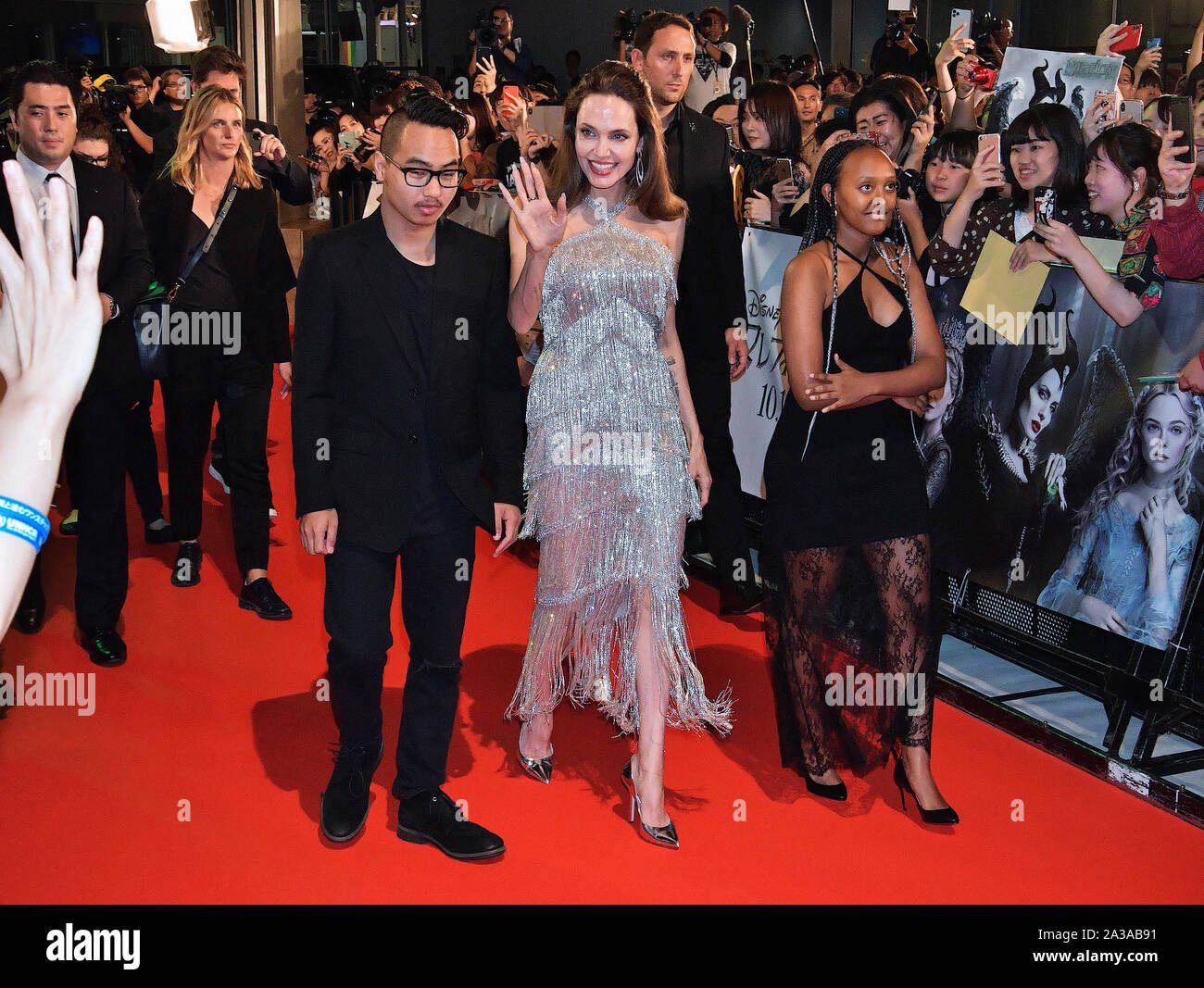 (L-R)Maddox Jolie-Pitt, Angelina Jolie and Zahara Marley Jolie-Pitt attend the Japan premiere for 'Maleficent: Mistress of Evil' at Roppongi Hills Arena in Tokyo, Japan on October 3, 2019. Credit: AFLO/Alamy Live News Stock Photo