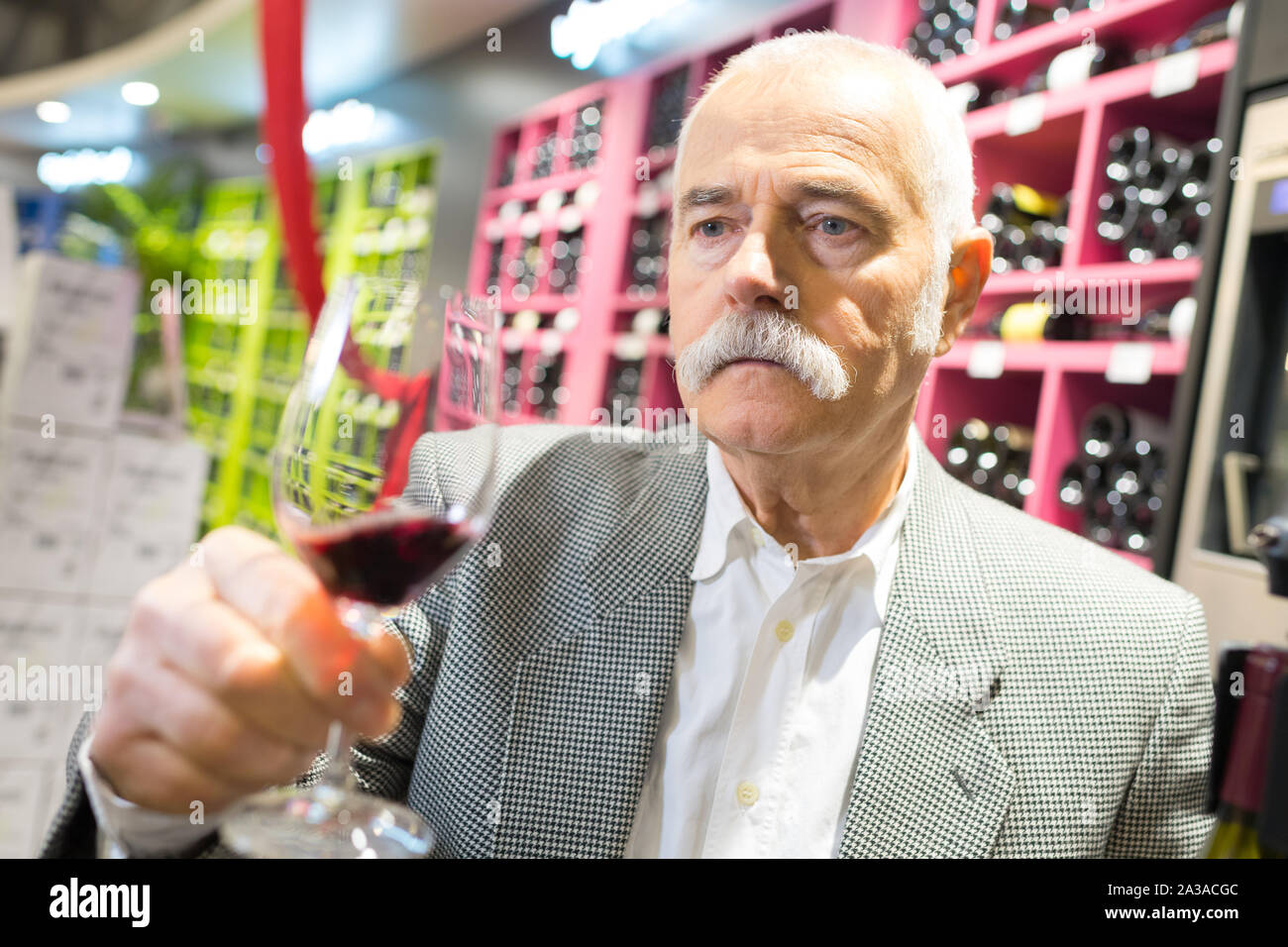 senior man tasting wine thinking deeply on life Stock Photo - Alamy