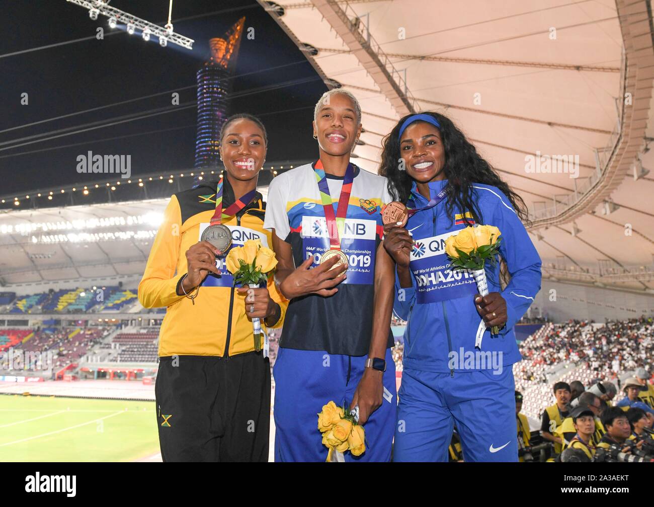Doha, Qatar. 6th Oct, 2019. Silver medalist, Shanieka Ricketts of Jamaica,  gold medalist, Yulimar Rojas of Venezuela, and bronze medalist, Caterine  Ibarguen of Columbia (from L to R), pose for photos during