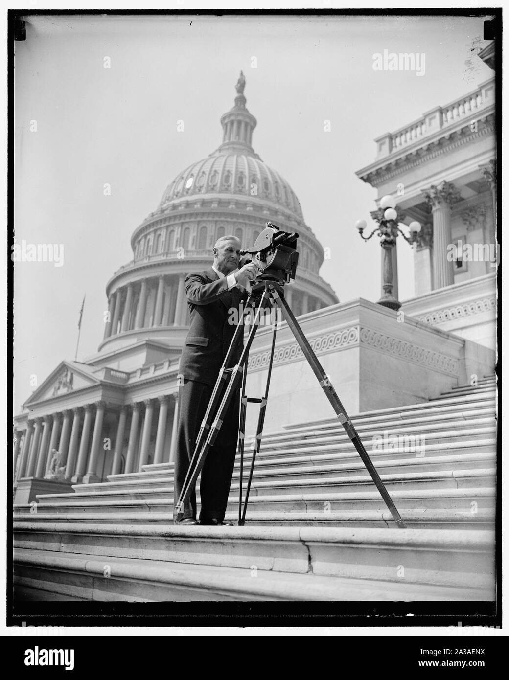Sen. McAdoo with movie cameras at Capitol, 4/13/38. Golden State Stock Photo