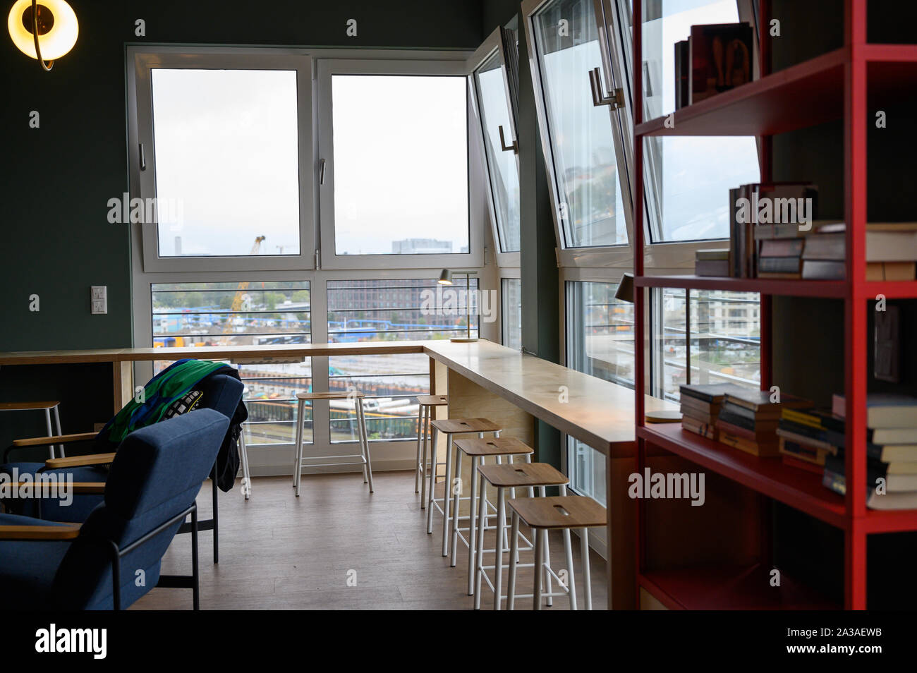 Berlin, Germany. 01st Oct, 2019. In a so-called community room in a newly built residential quarter of the WG provider Medici Living under the "Quarters" brand, chairs stand on a window front. The provider is presenting 94 new premium flats for young and well-earning professionals. (to "Senate Administration: Co-Living hardly influences Berlin housing market") Credit: Christophe Gateau/dpa/Alamy Live News Stock Photo