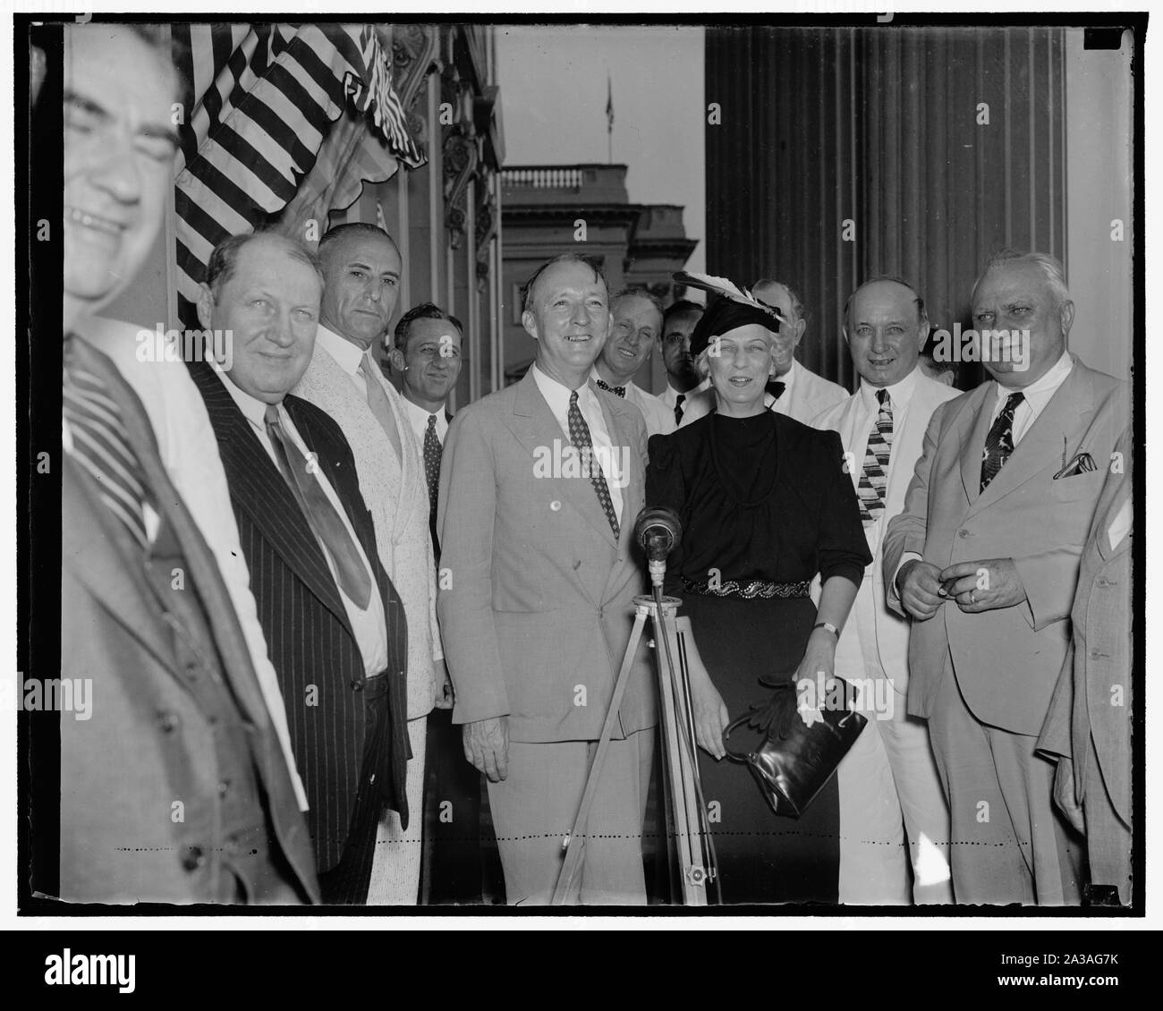 Senate confirms Black 63-16 Washington, D.C., Aug. 17. The new Associate Justice of the Supreme Court with Mrs. Hugo L. Black were all smiles as they were surrounded by the Senate colleagues of Black following his confirmation by the Seante 63-16. In the photograph, left to right: Senators Fred H. Brown, New Hampshire; M.M. Neely, West Virginia; Carl A. Hatch, New Mexico; Justice Black, Senators Henry A. Ashurst, Arizona; Sherman Minton, Indiana; Mrs Black; Senators George McGill, Kansas; and WIlliam Dieterich, Illinois, 8/17/37 Stock Photo
