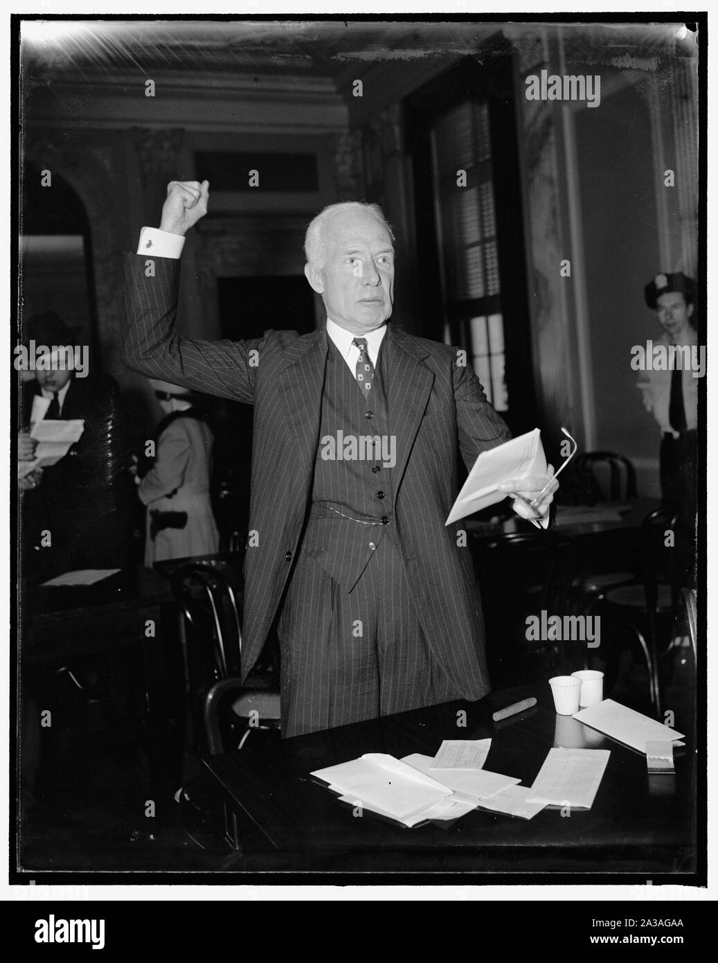 Senate lobby committee again refuffed. Washington, D.C., April 20. Efforts of the Senate Lobby Committee to obtain records of the National Committee to uphold Constitutional Government hit another snag today when Sumner Gerard, Treasurer of the Organization, testified he did not have in his control a list of contributors to the National Committee. Gerard, A brother of James Gerard, former Ambassador to Germany, was questioned by the committee in his investigating of Lobby activities uding congressional consideration of the Government reorganization bill, 4/20/38 Stock Photo