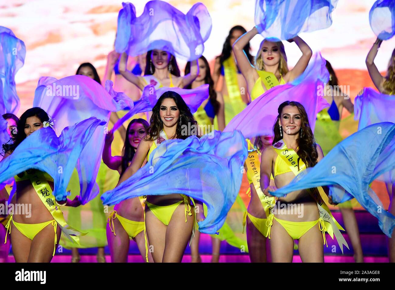 Qingdao, China. 6th Oct 2019.  Contestants wearing swimming suits pose during the Miss Tourism World 2019 Global Finals in Qingdao, east China's Shandong Province, Oct. 6, 2019. The beauty pageant concluded Sunday in the coastal city Qingdao, in which Miss Tourism Mexico Michelle Hewitt Zapata won the championship, Svetlana Mamaeva from Canada won the first runner-up, and Tan Ruoyi from China won the second runner-up.  United States, Venezuela, France, Brazil, SCO (Shanghai Cooperation Organization) member states as Credit: Xinhua/Alamy Live News Stock Photo