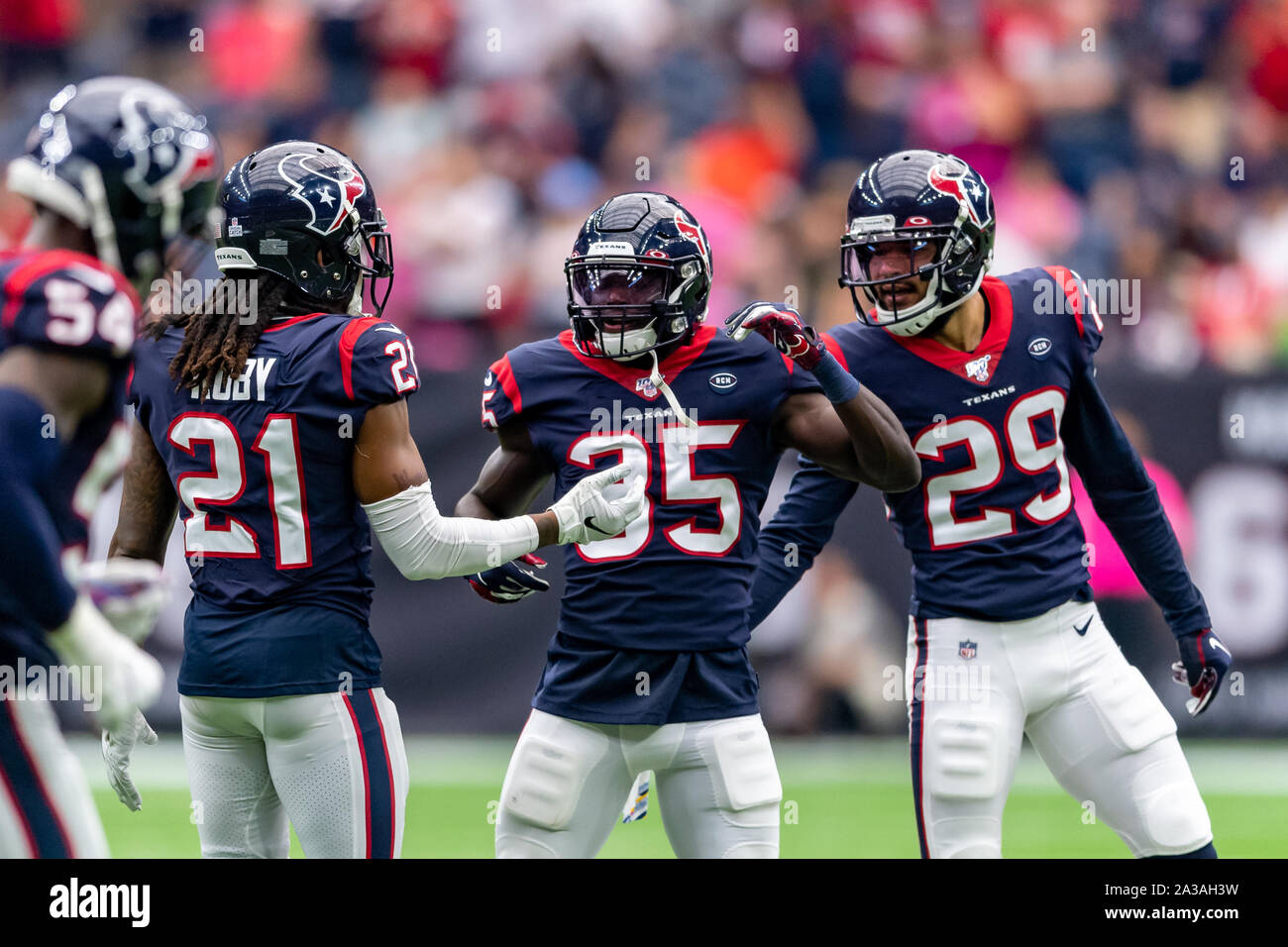 Houston, Texas, USA. 06th Oct, 2019. Houston Texans cornerback Phillip Gaines (29) and cornerback Bradley Roby (21) escorts defensive back Keion Crossen (35) way from an Atlanta Falcons player during the game between the Atlanta Falcons and the Houston Texans at NRG Stadium in Houston, Texas. Texans win 53-32. Maria Lysaker/CSM/Alamy Live News Stock Photo