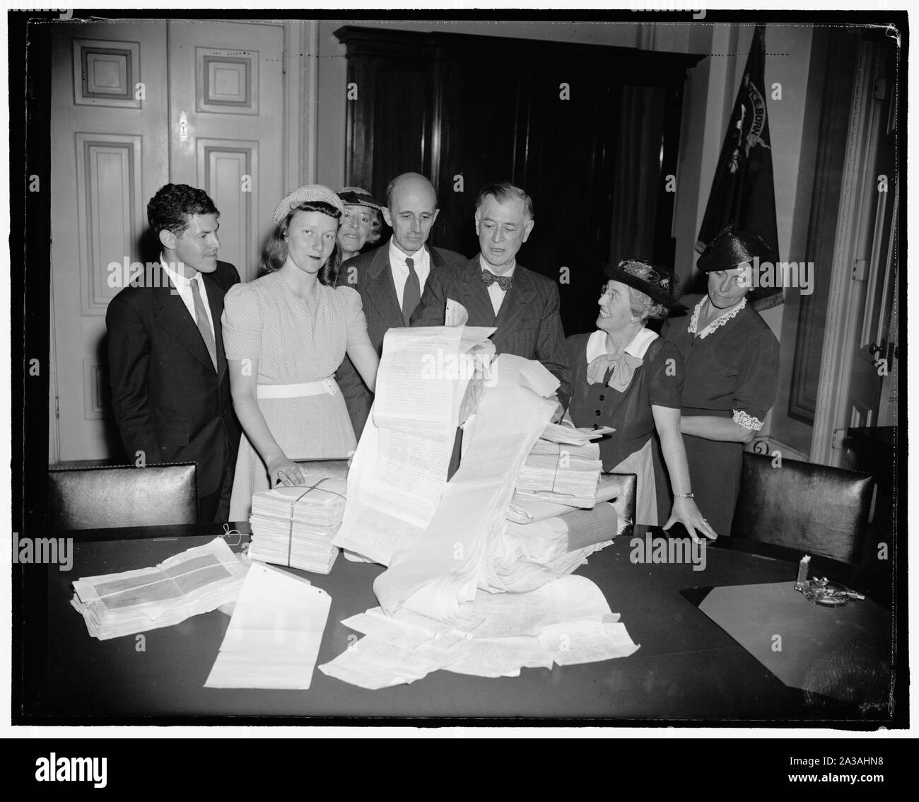 Senator Pittman gets petition urging embargos against Japan. Washington, D.C., July 18. A delegation representing the American Committee for non-participation in Japanese agression, headed by Eleanor Fabyan of Boston, called on Senator Key Pittman, Chairman of the Senate Foreign Relations Committee, this afternoon to present petitions urging embargoes against Japan. Miss Fabyan said the petitions were signed by 300,000 persons. Left to right: Gabriel Lasker, Cambridge; Gertrude Ely, Phila., PA; Eleanor Fabyan, Boston, Mass.; Dr. Roger Greene; Senator Pittman; Mrs. George Fitch, Pasadena, Cal.; Stock Photo