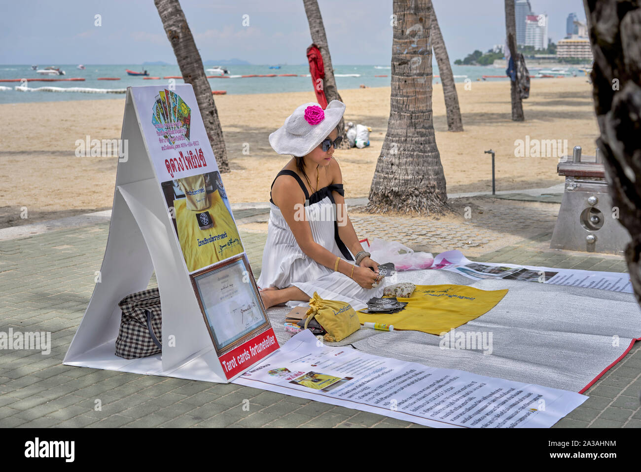 Fortune teller, cards. Woman Tarot card reader. Thailand Southeast Asia Stock Photo