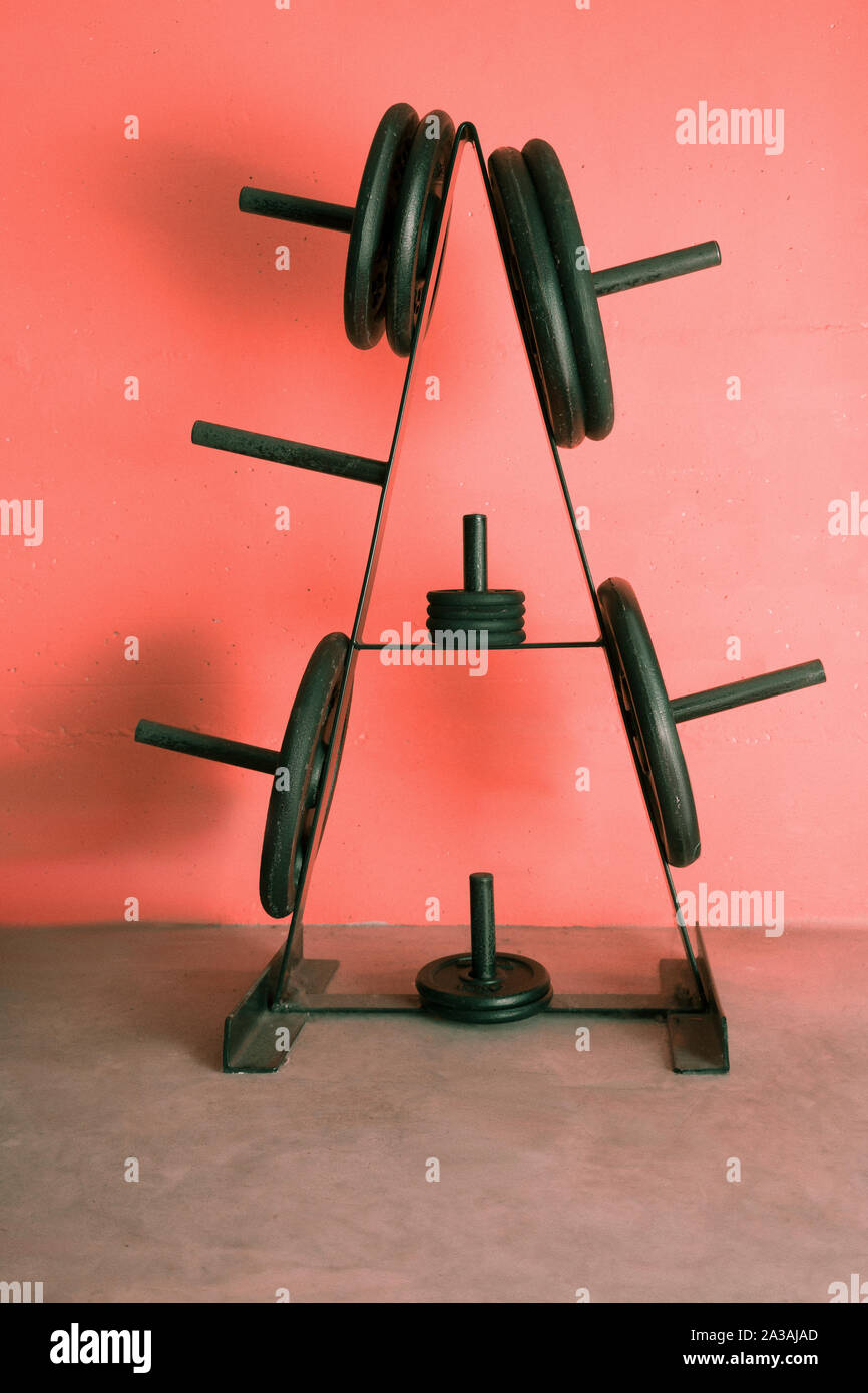 Weights rack in a garage gym Stock Photo