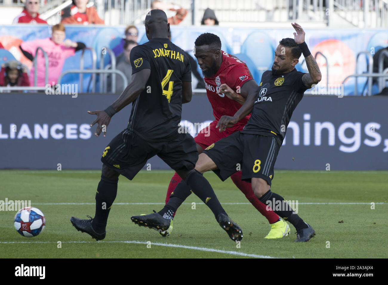 Toronto, Ontario, Canada. 6th Oct, 2019. ARTUR (8), JONATHAN MENSAH (4) and JOZY ALTIDORE (17) in action during the MLS game between between Toronto FC and Columbus Crew SC. Toronto won 1-0 Credit: Angel Marchini/ZUMA Wire/Alamy Live News Stock Photo