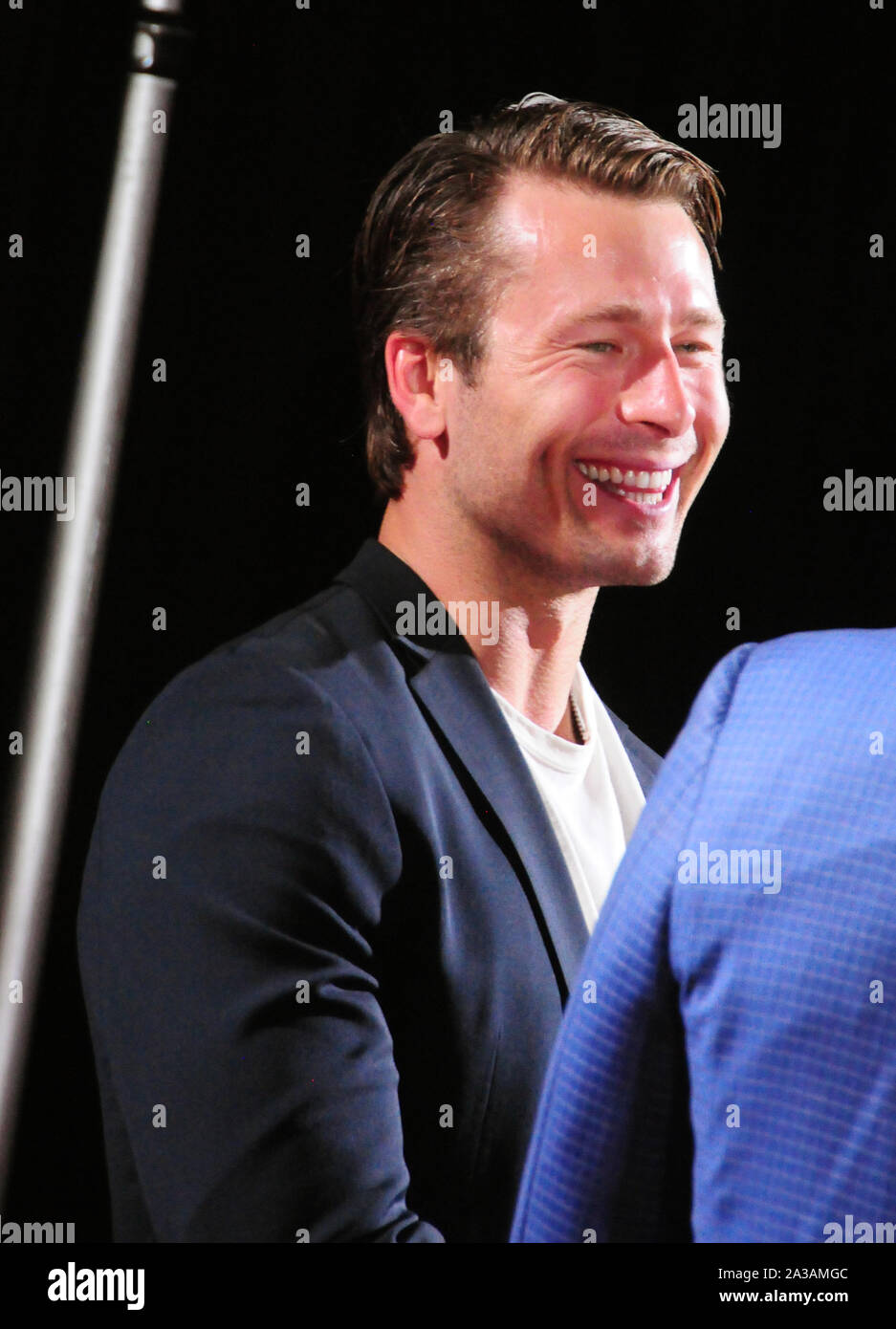 Hollywood, California, USA 6th October 2019 Actor Glen Powell attends
