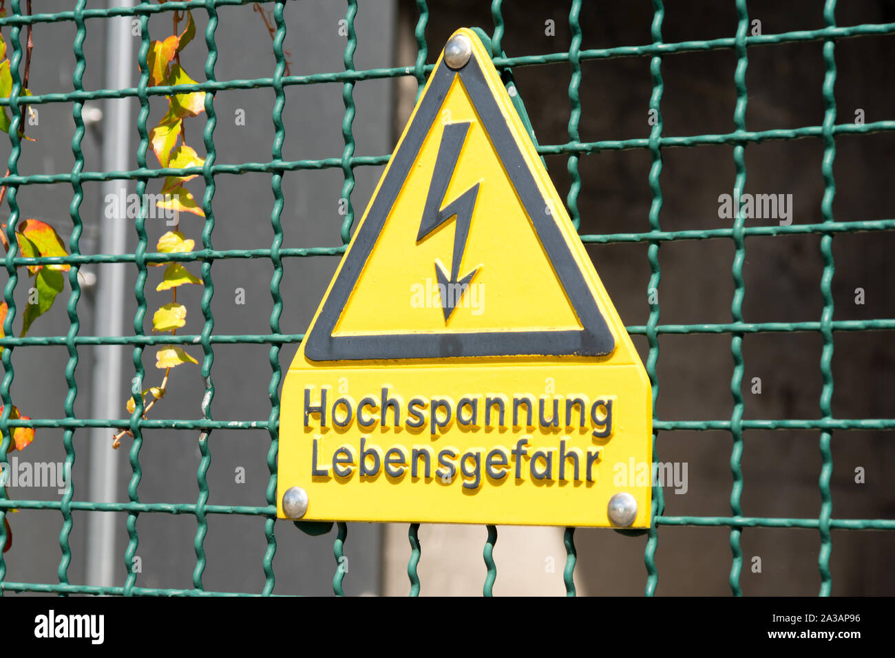 Warning of high voltage in German Stock Photo Alamy