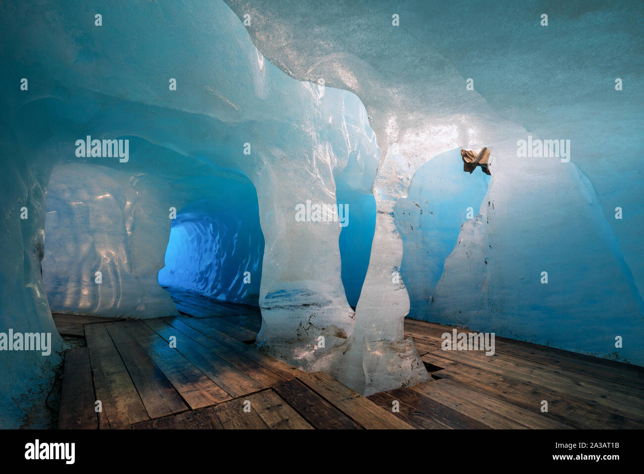 Inside Rhone Gletscher glacier ice cave at Furkapass, Obergoms, Alps, Switzerland Stock Photo