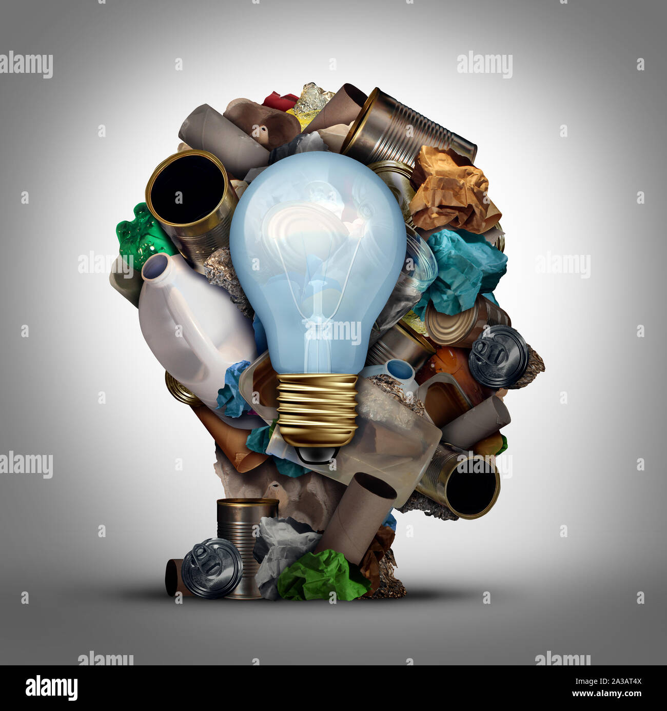 Recycling solution and environmental garbage management to reuse waste as paper glass metal and plastic bottles in a head shape as a symbol. Stock Photo