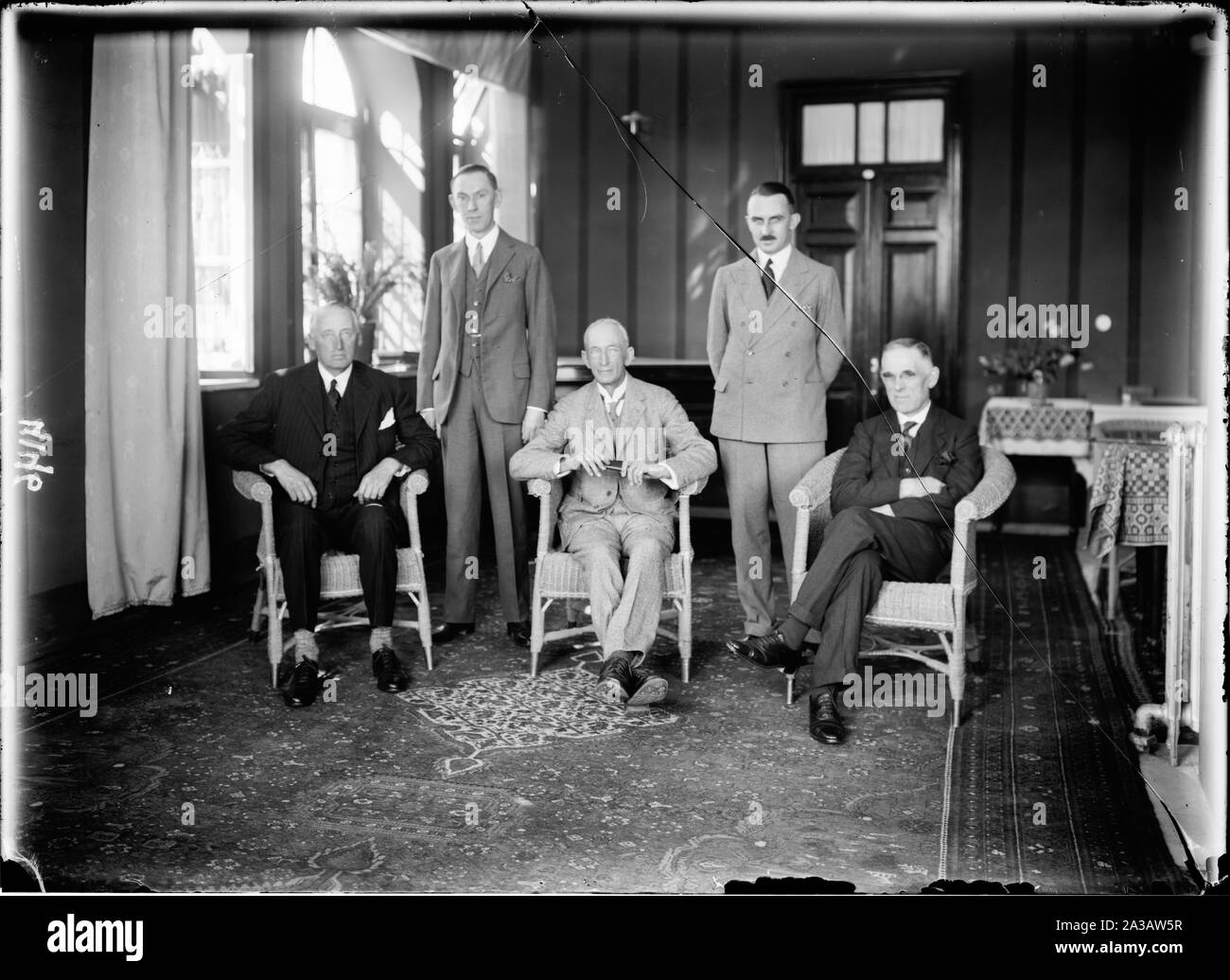 The 1929 riots. August 23 to 31. The Shaw Commission of Inquiry. Re. Causes and guilt of the riots.; A group photograph of the members of the Commission on the Palestine Disturbances of August 1929, commonly known as the Shaw Commission, that was established to investigate the 1929 Palestine riots which caused the deaths of 243 Jews and Arabs. The chairman of the Commission, Sir Walter Sidney Shaw, is seated in the centre. From left to right: Henry Betterton, Rhys Hopkin Morris, Walter Sidney Shaw, () possibly T.I.K. Lloyd of the Colonial Office, Henry Snell.; Stock Photo