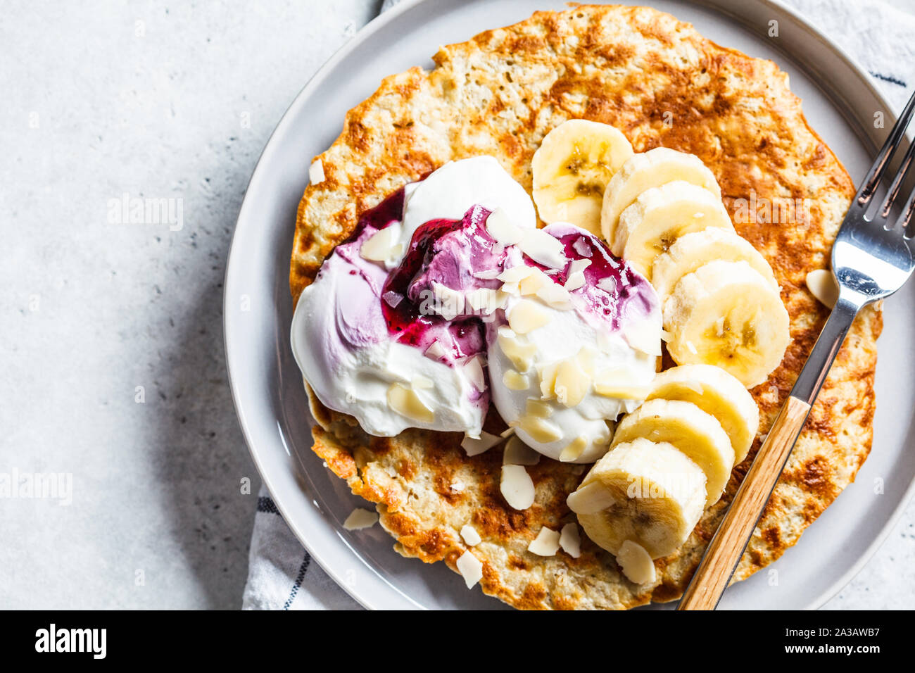 Sweet oatmeal omelette with banana and yogurt. Healthy breakfast concept  Stock Photo - Alamy