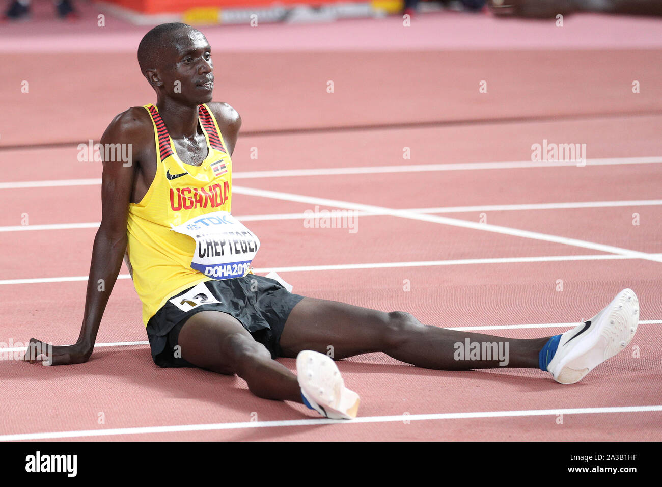 Doha, Qatar. 6th Oct, 2019. Joshua Cheptegei of Uganda reacts after the men's 10000m at the 2019 IAAF World Championships in Doha, Qatar, Oct. 6, 2019. Credit: Li Ming/Xinhua/Alamy Live News Stock Photo