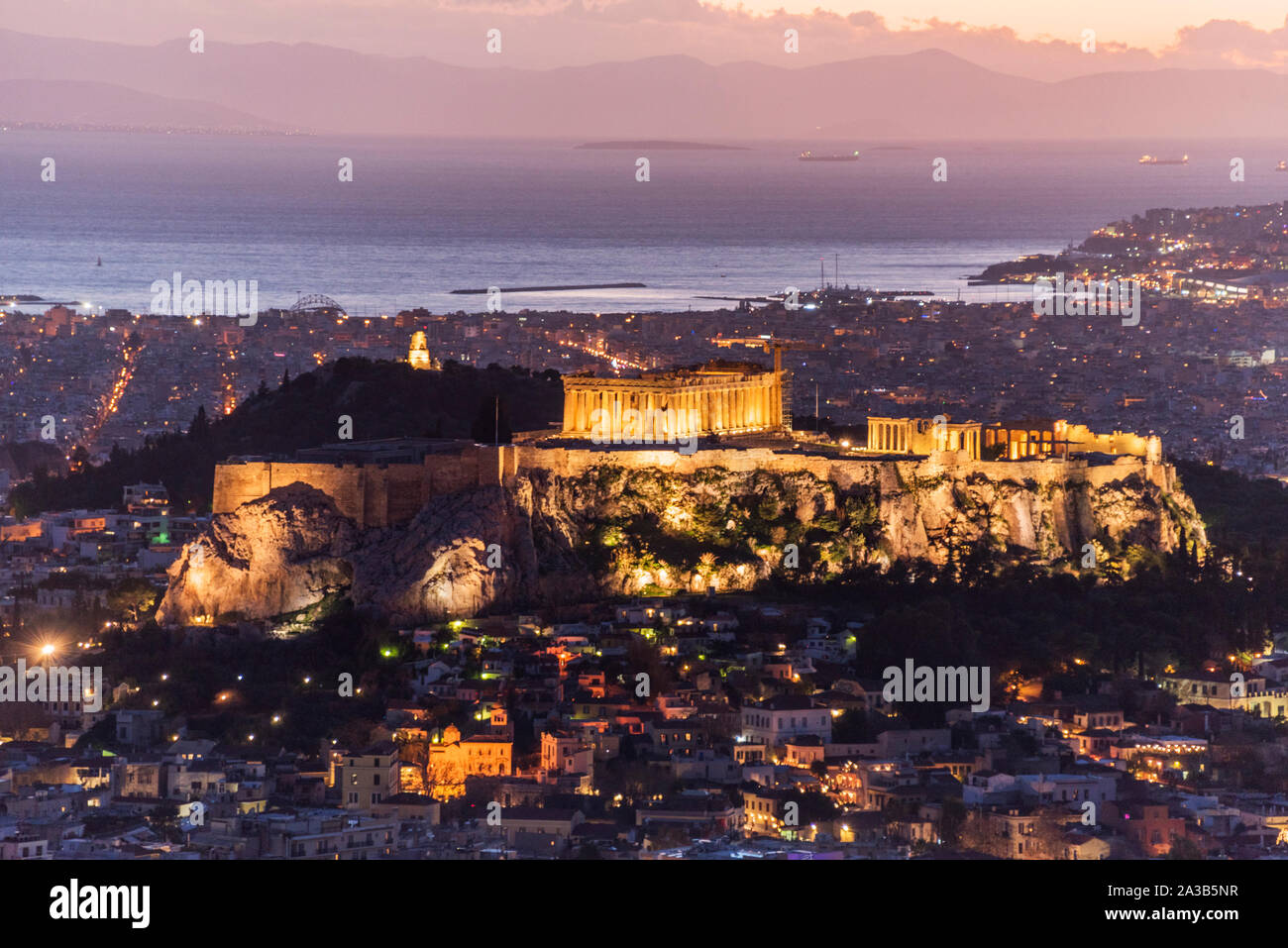View of Athens and the Acropolis during nightfall Stock Photo