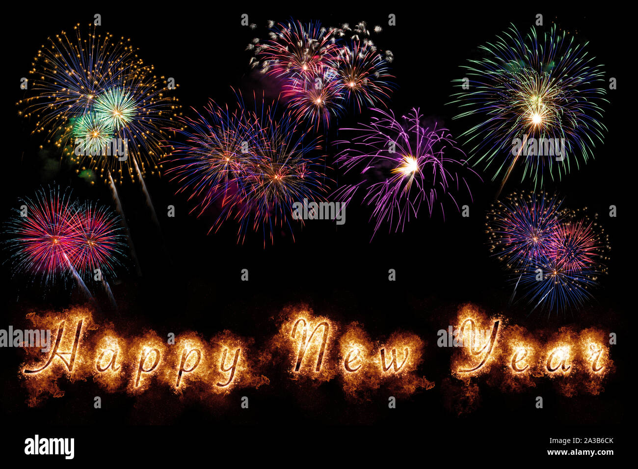 Happy New Year letters with sparkle, fire and fireworks on black ...