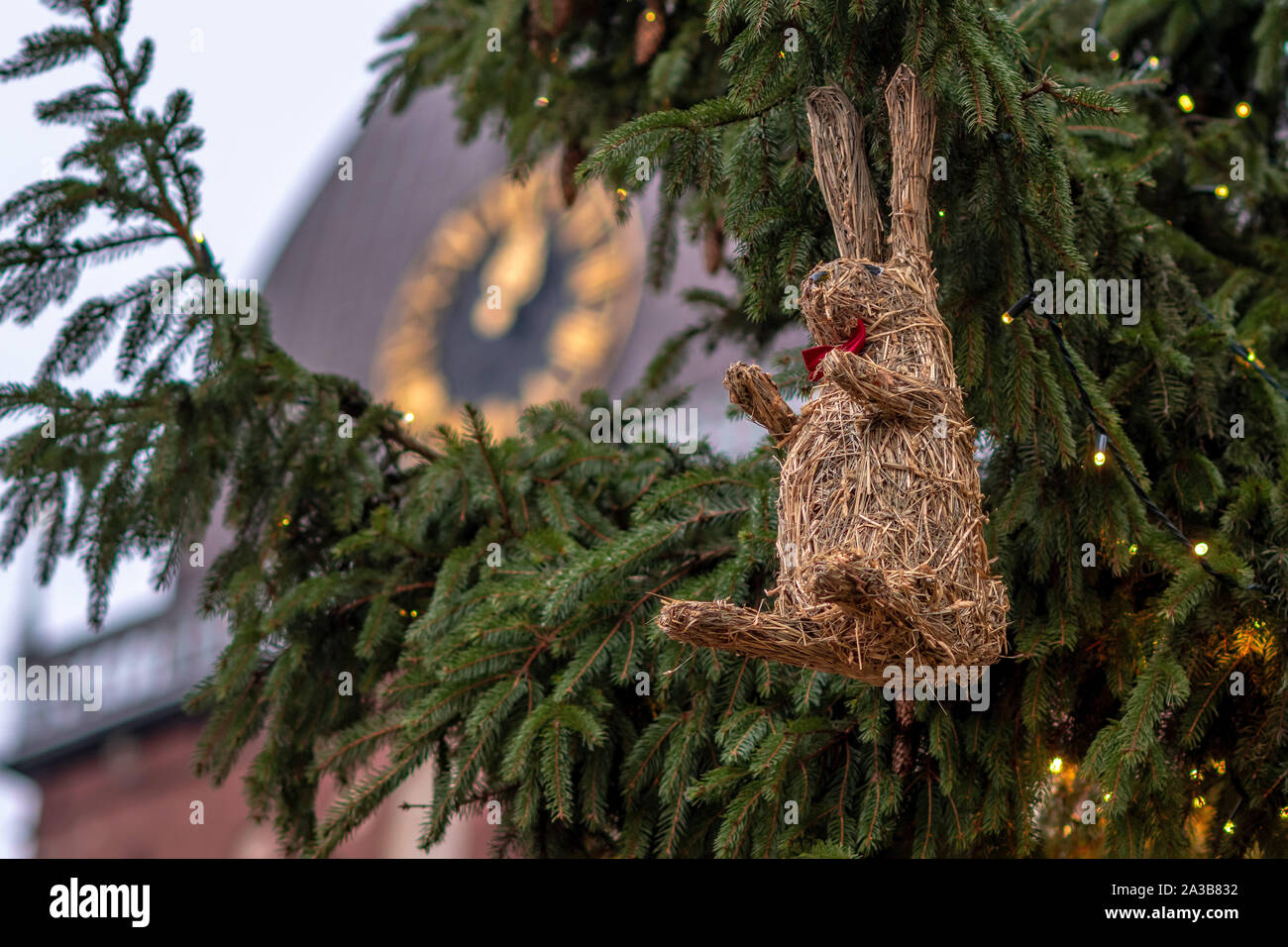 Christmas Decorations And Lights In The Background Clock In