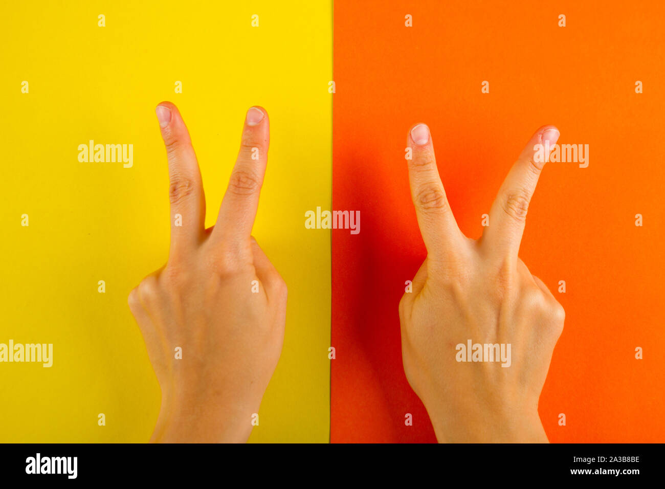 Hand gesture V sign for victory or peace. Two hands Stock Photo Alamy