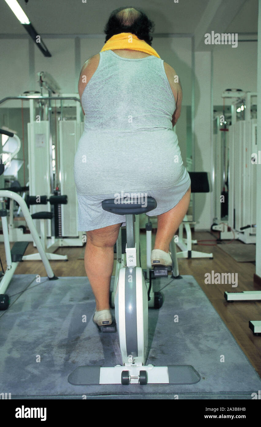 Obese man cycling hires stock photography and images Alamy