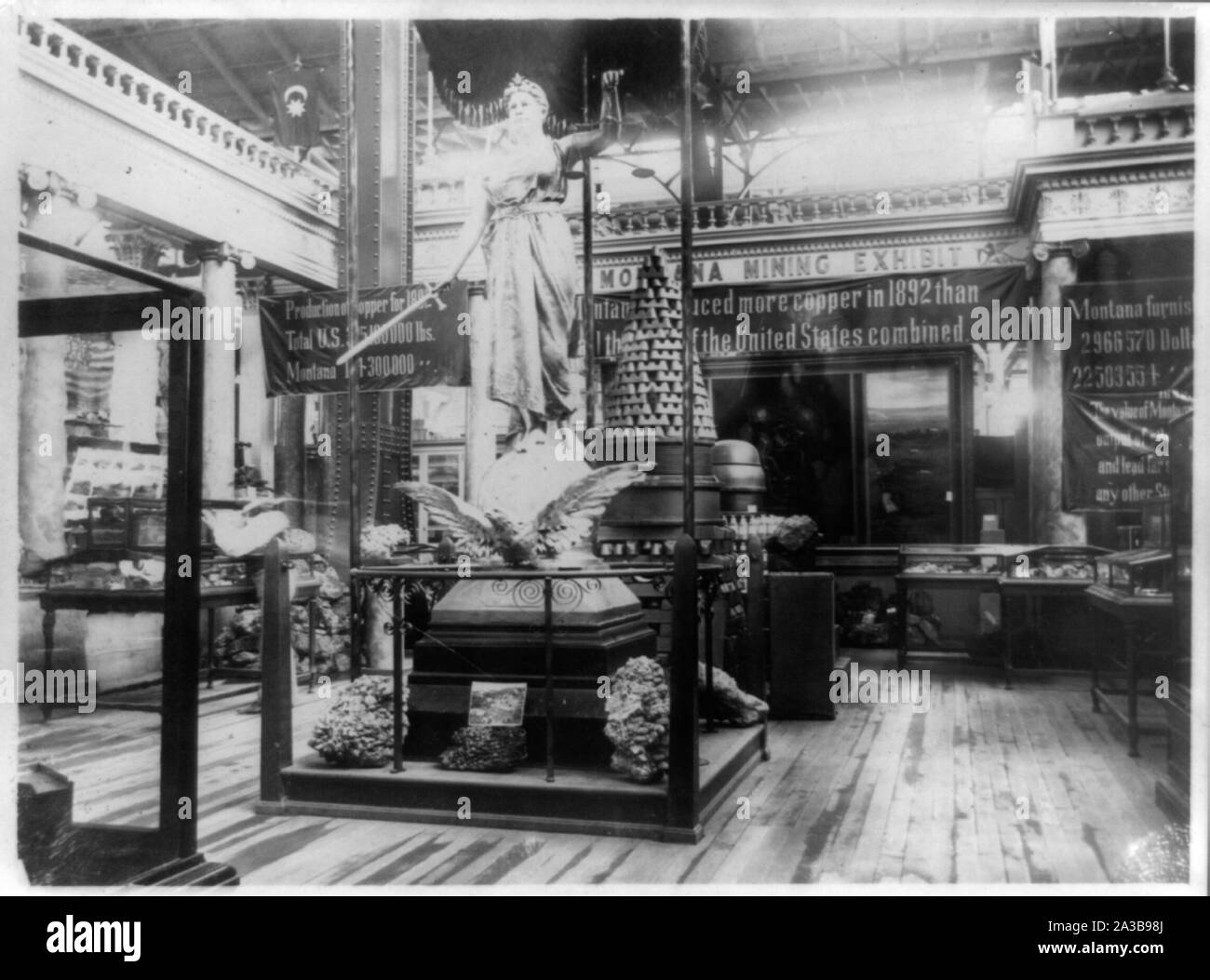 Silver statue of Justice in exhibit hall, Montana exhibit, World's ...