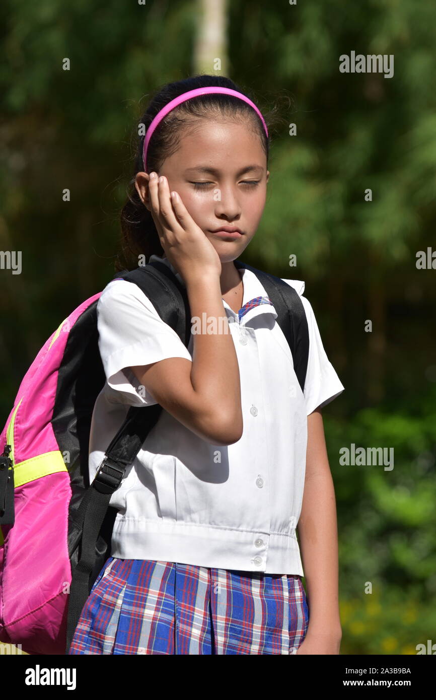 An Unhappy Female Student School Girl Stock Photo