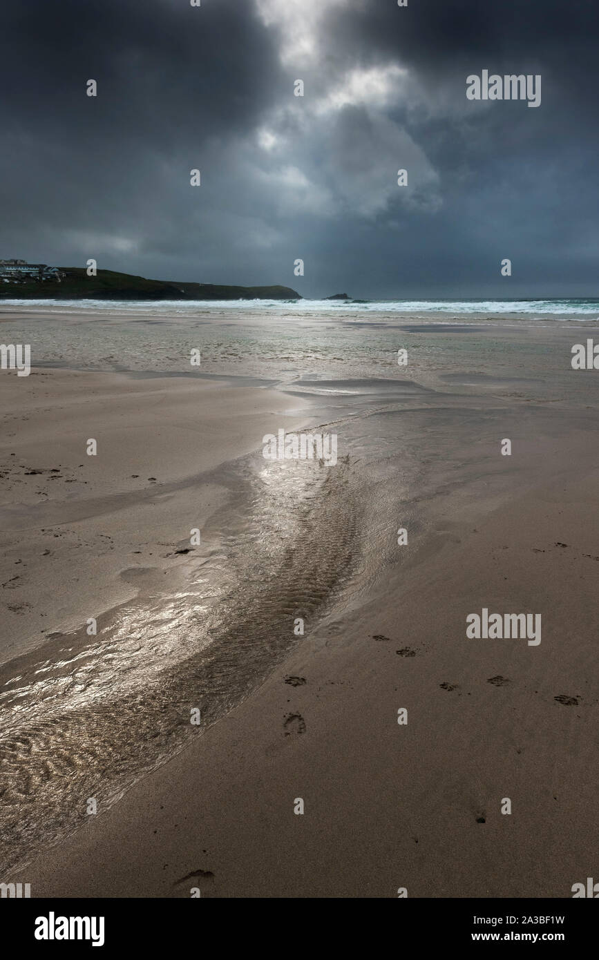 Chilly autumnal weather over a deserted Fistral Beach in Newquay in Cornwall. Stock Photo