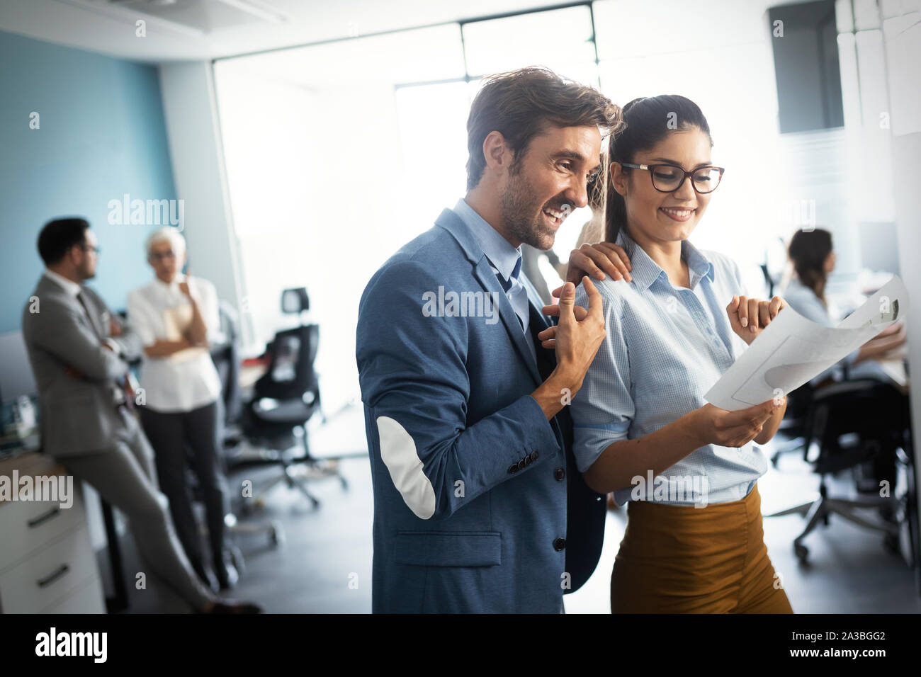 Group of successful business people at work in office Stock Photo - Alamy