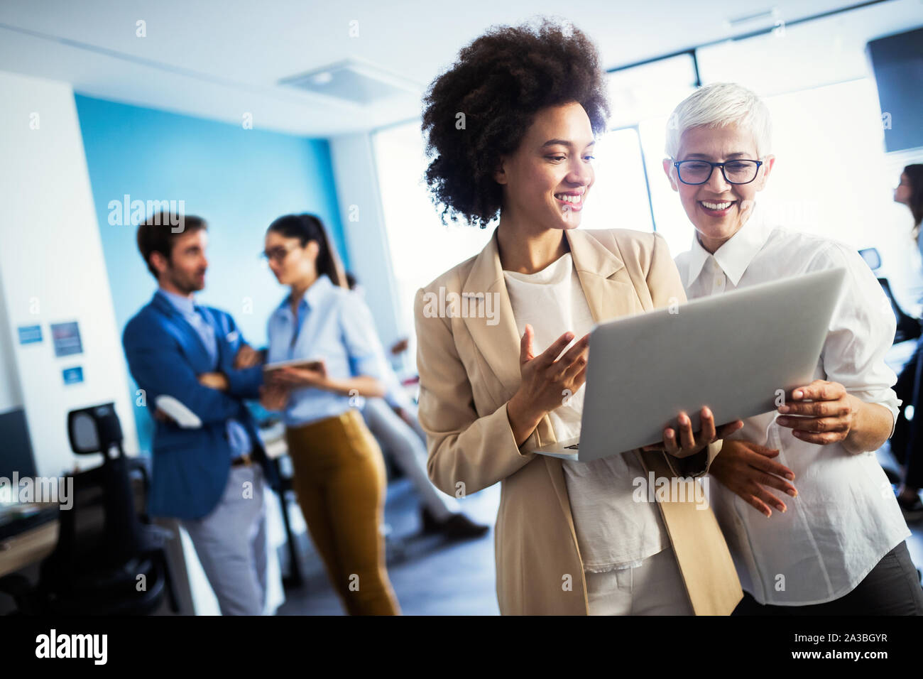 Successful business group of people at work in office Stock Photo - Alamy
