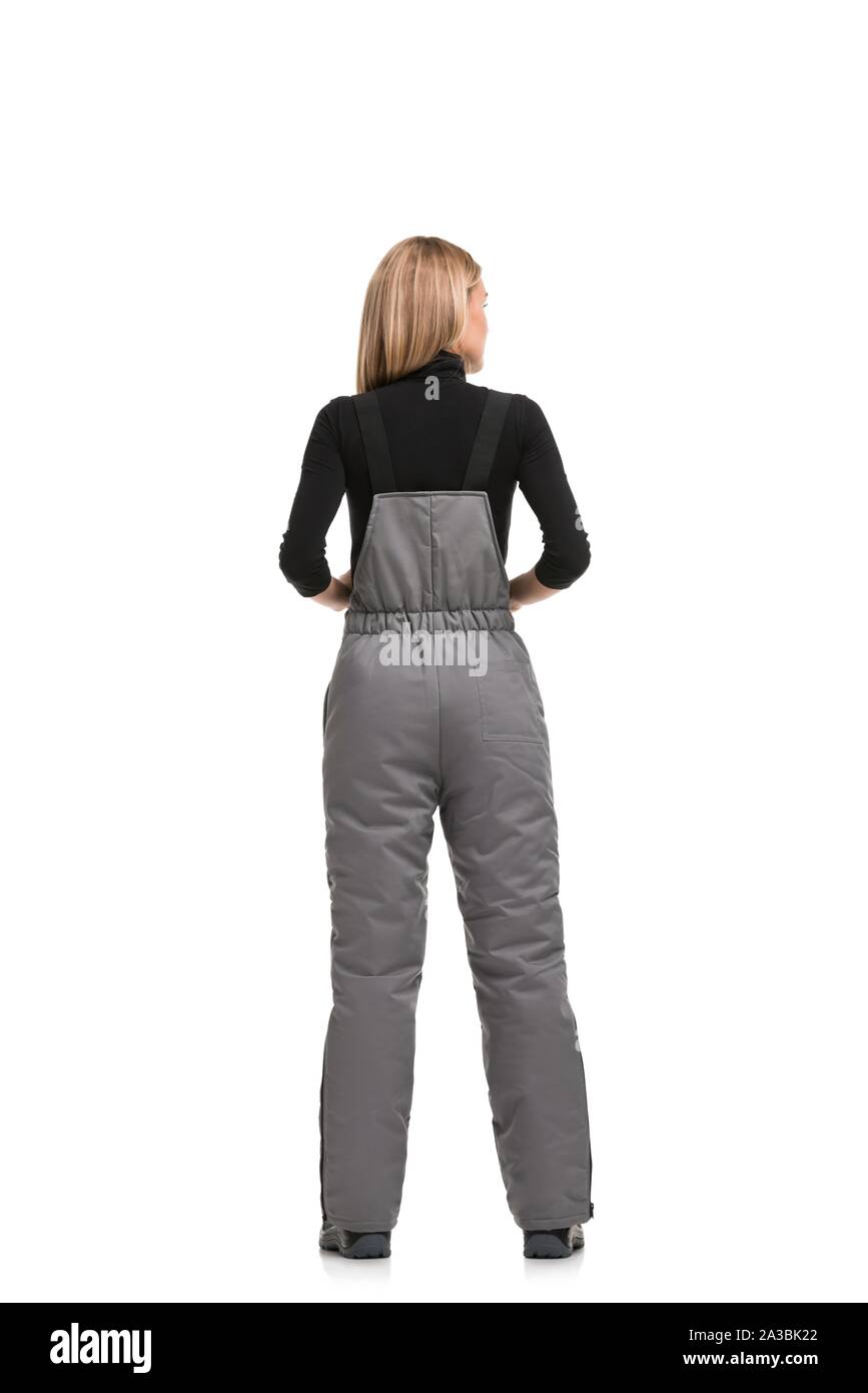 Woman in gray working overalls rearview Stock Photo