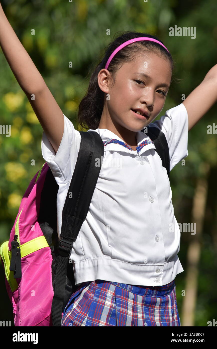 Young Diverse School Girl And Freedom Wearing School Uniform Stock