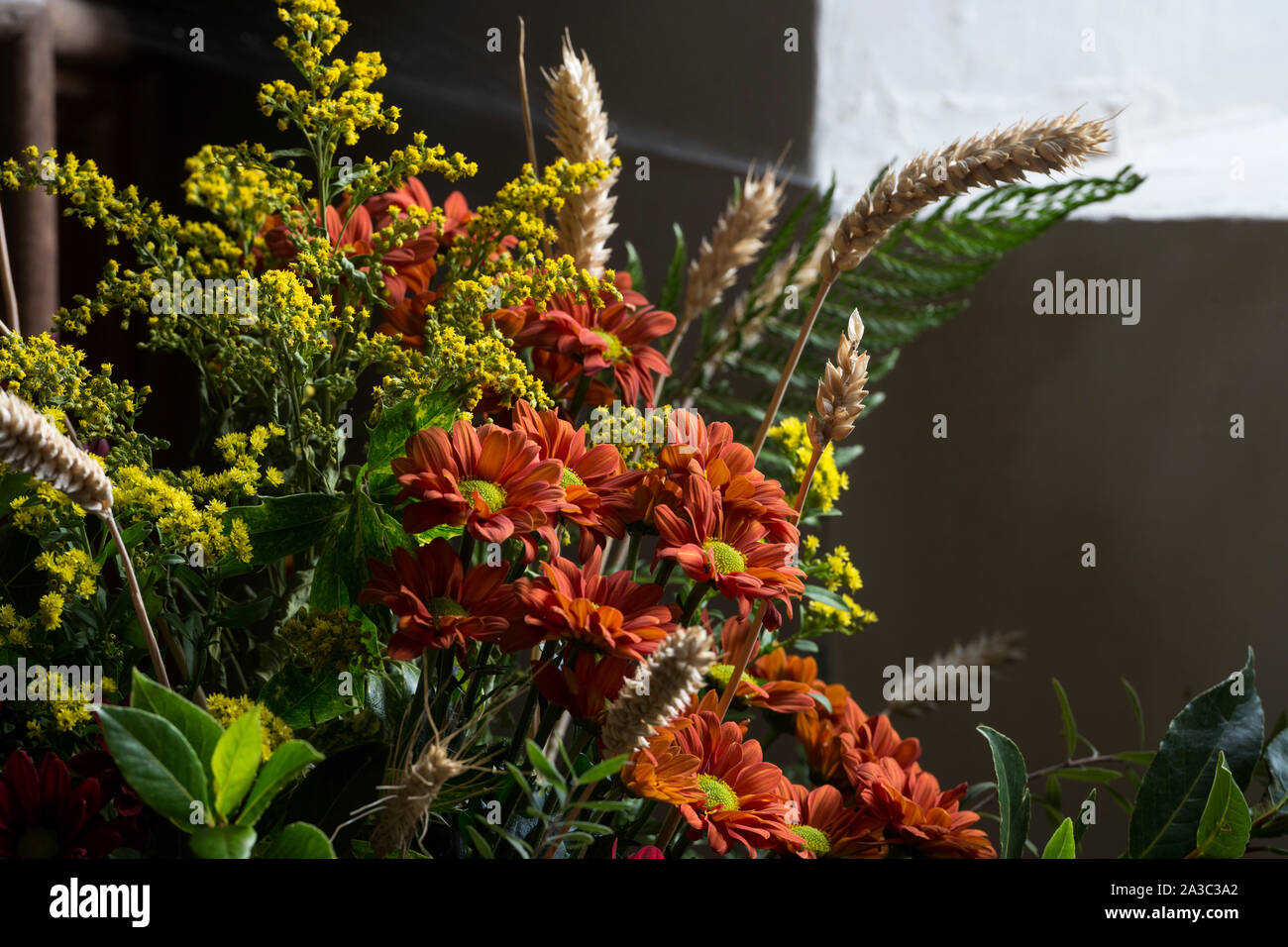 Harvest festival flower arrangement in a church, UK Stock Photo Alamy