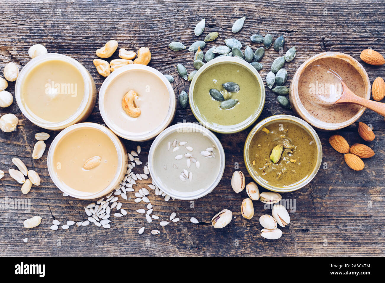 Nuts and seeds butter with ingredients. Homemade raw organic peanut