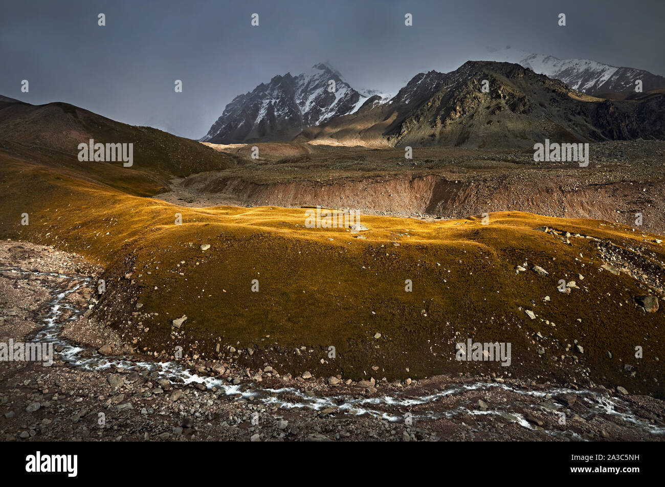 Tianshan Mountains Rivers Landscape of Tian Shan Mountain Valley and river at sunset in ...