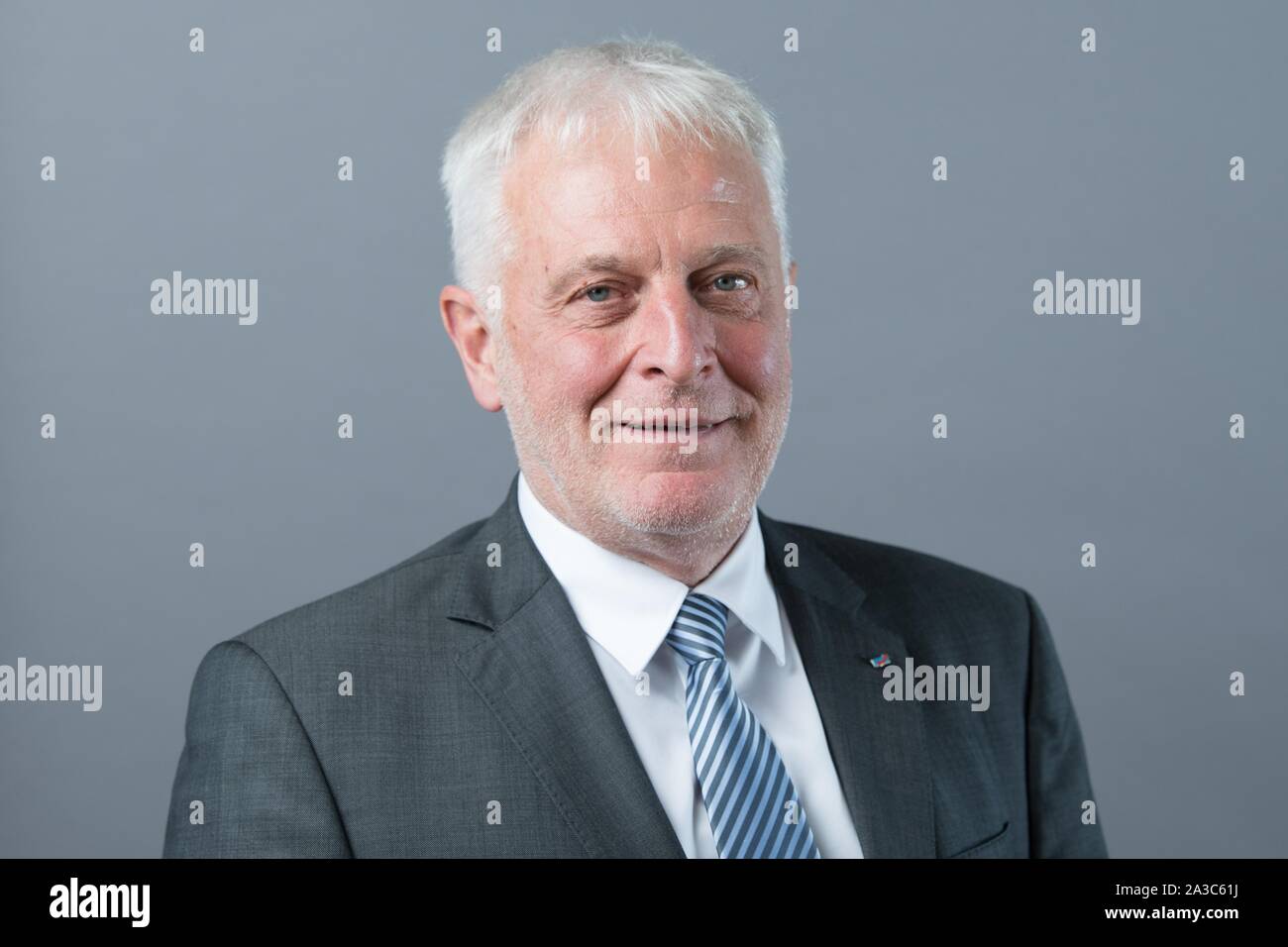 Dresden, Germany. 01st Oct, 2019. Hans-Jürgen Zickler (AfD) stands in front of a photo wall on the occasion of the constituent session of the Saxon state parliament. Credit: Sebastian Kahnert/dpa-Zentralbild/ZB/dpa/Alamy Live News Stock Photo