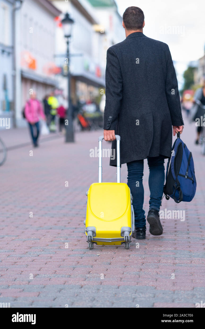 away yellow luggage
