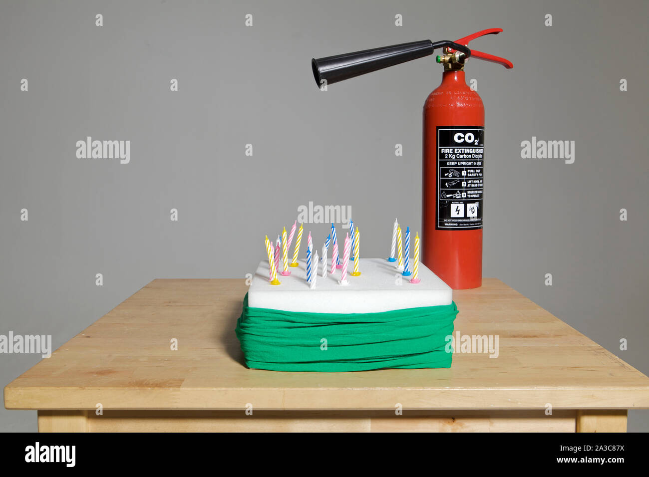Birthday Cake & Fire Extinguisher Stock Photo Alamy