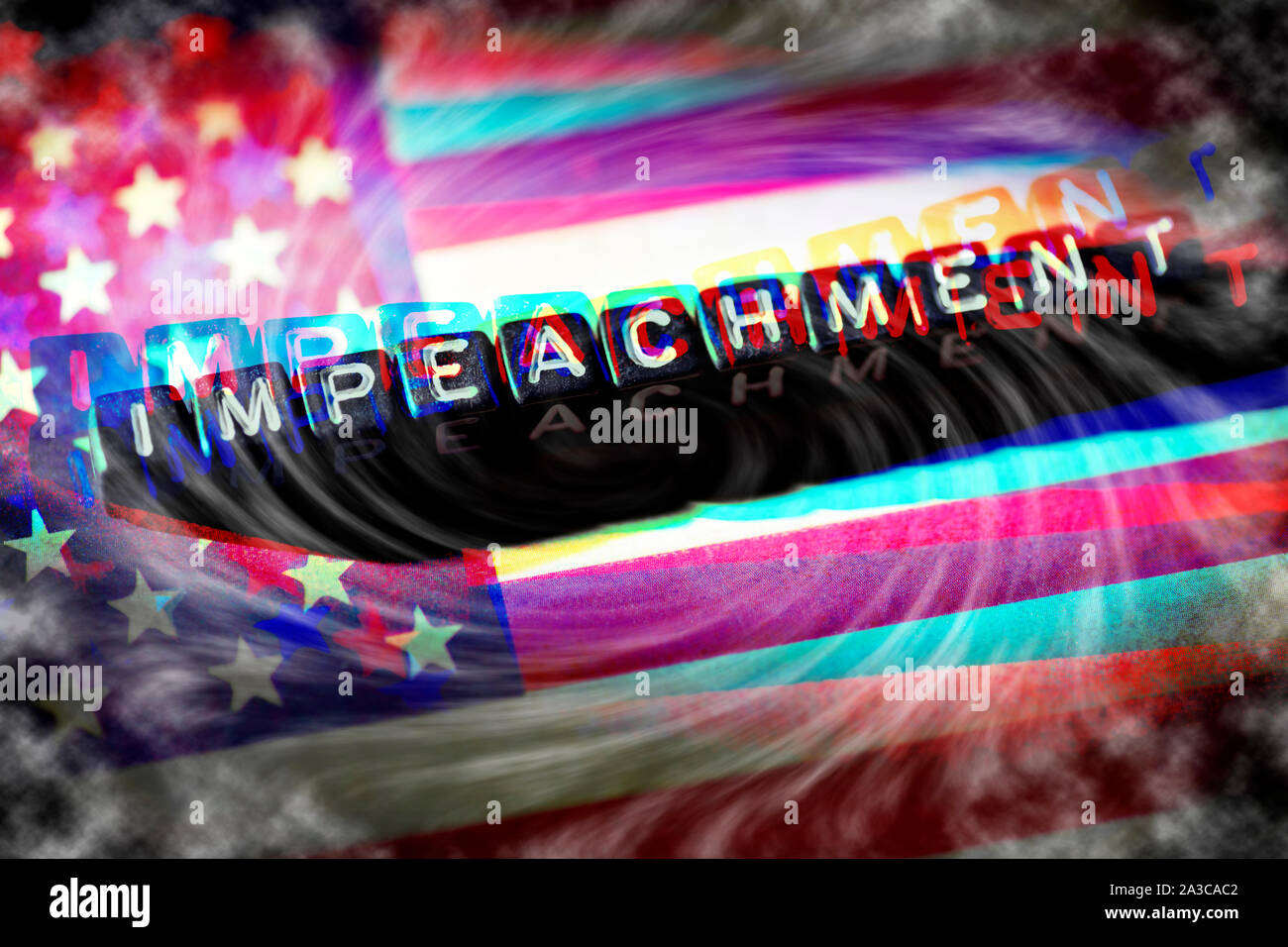 Letter cubes forming the word impeachment on US flag Stock Photo