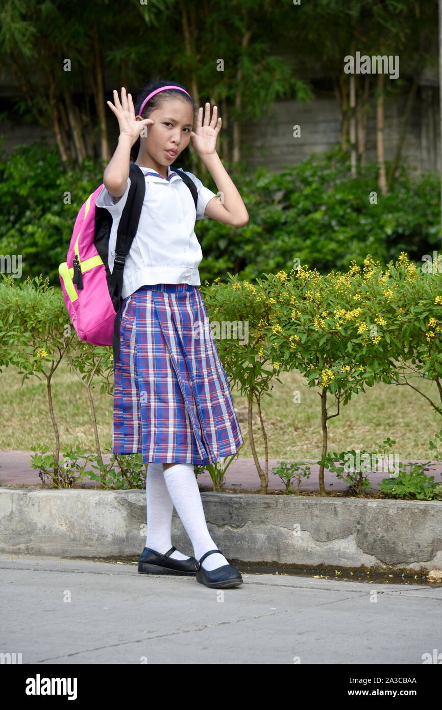 Prep Girl Student Making Funny Faces Wearing School Uniform Stock Photo